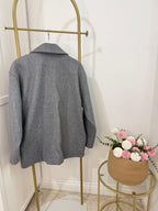     Back view of Zara grey oversized coat on hanger