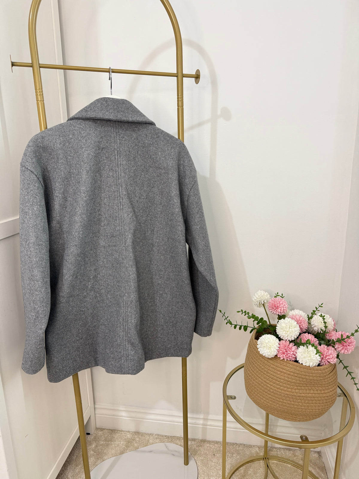     Back view of Zara grey oversized coat on hanger