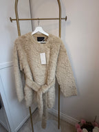     Front view of Zara beige faux fur belted coat on hanger