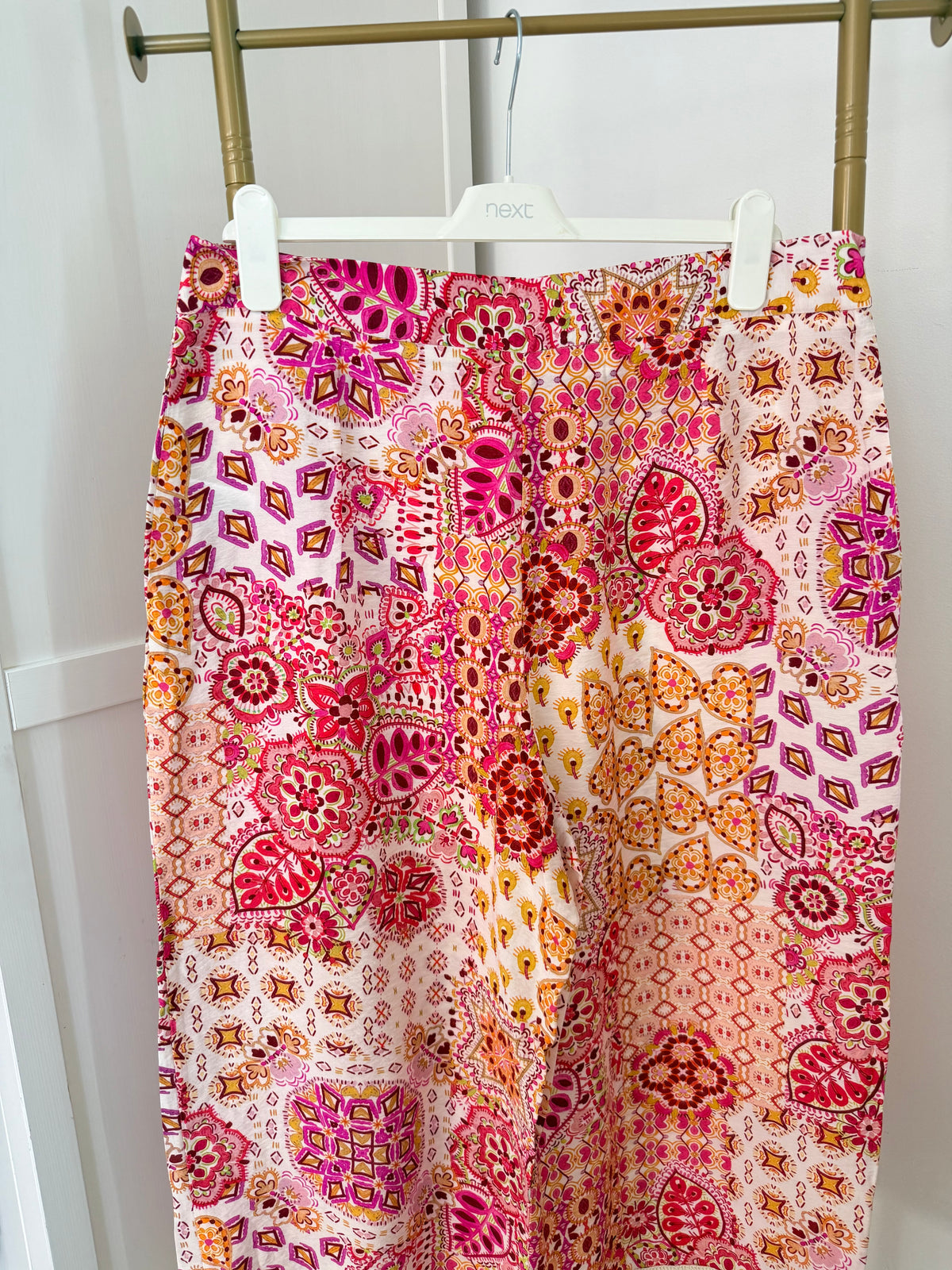     Close-up front view of Zara multicoloured printed trousers