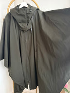     Back detail of Zara khaki hooded cape rain coat