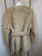     Back view of Zara beige faux fur belted coat with waist belt