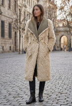     Woman wearing beige side of Zara reversible faux fur coat