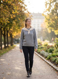     Zara grey knit sweater with beige scarf styled on model
