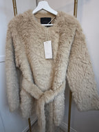     Front view of Zara beige faux fur belted coat with tag and tied belt