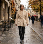     Woman wearing Zara beige faux fur belted coat on a city street