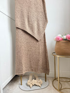     Close-up of Zara beige knit co-ord set asymmetric design