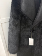     Close-up of Zara black faux fur coat collar and front
