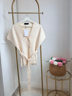     Front view of Zara cream knit belted waistcoat on hanger