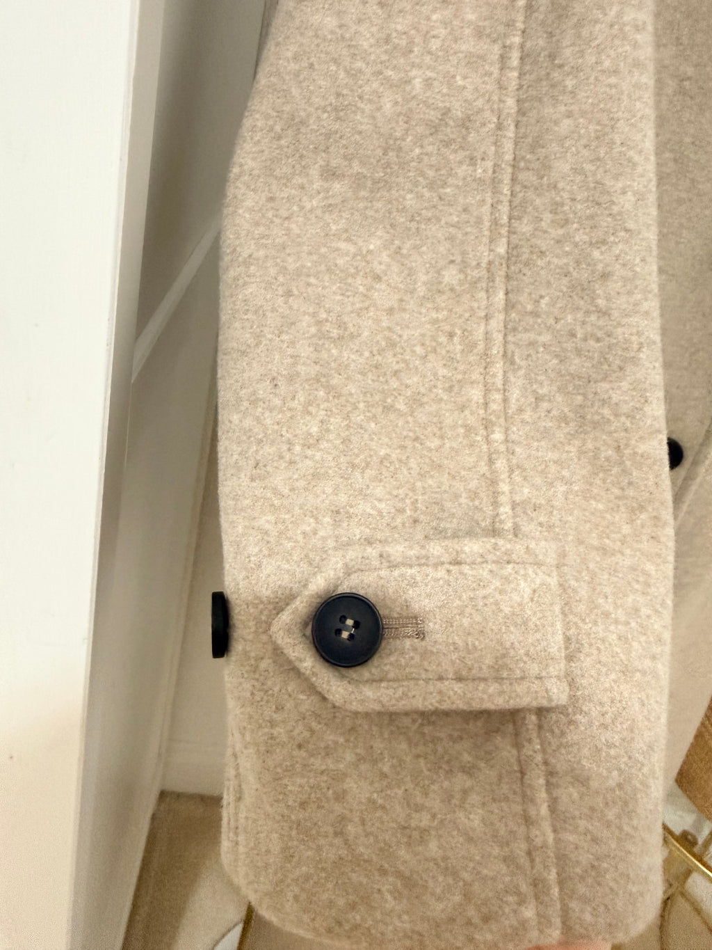     Zara beige wool blend coat pocket and button close-up