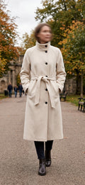     Woman wearing Zara cream belted wool blend long coat