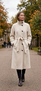     Woman wearing Zara cream belted wool blend long coat