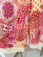     Zara pink multicoloured cropped trousers hem and print detail