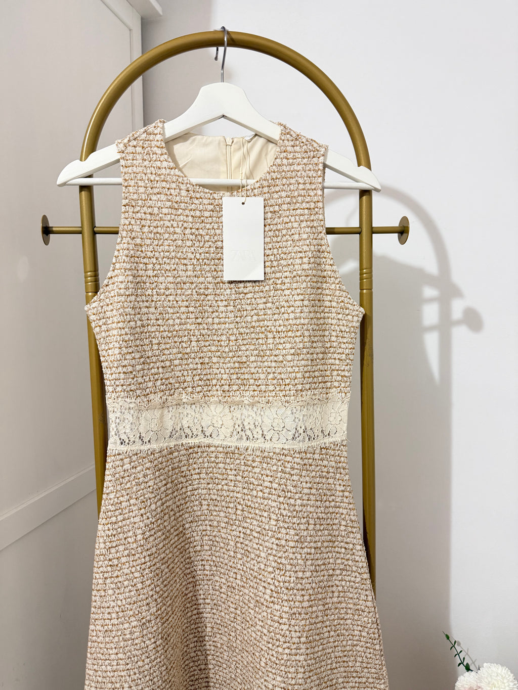     Front detail of Zara beige sleeveless knit midi dress