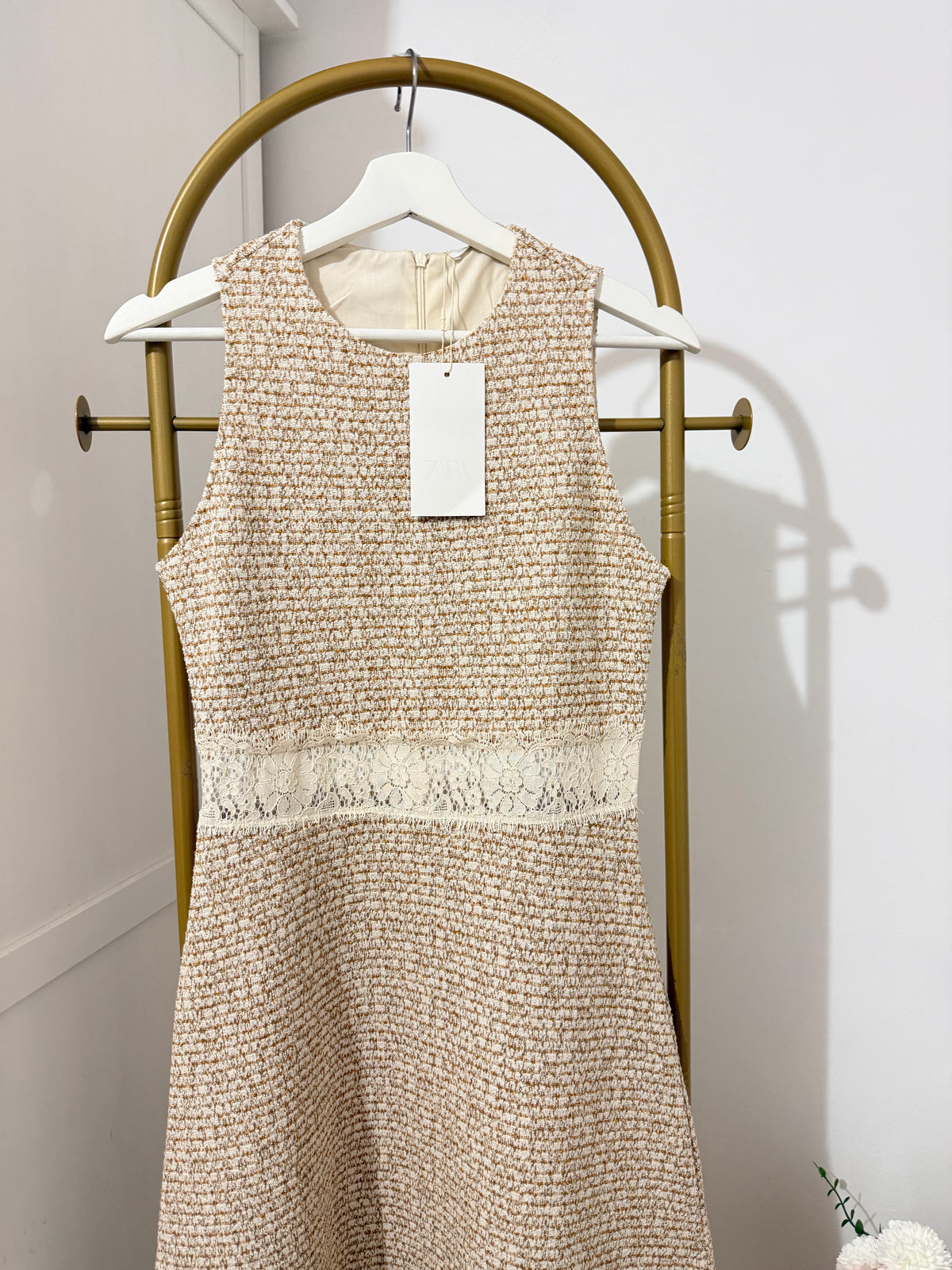     Front detail of Zara beige sleeveless knit midi dress