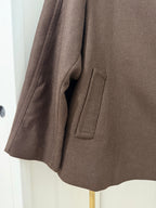     Close-up of pocket on Zara brown wool blend short coat