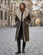     Woman wearing Zara brown reversible faux fur coat