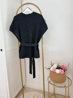     Back view of Zara grey knit belted waistcoat with tie belt