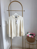     Front view of Zara cream wide sleeve knit jumper on hanger